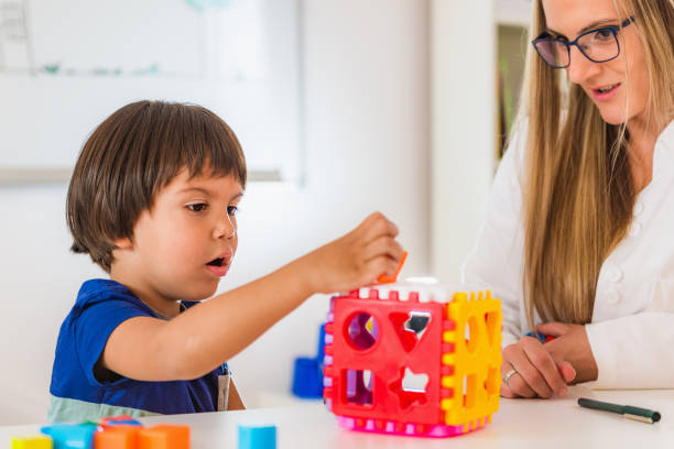 istock Child psychology, preschooler doing tests 899385610