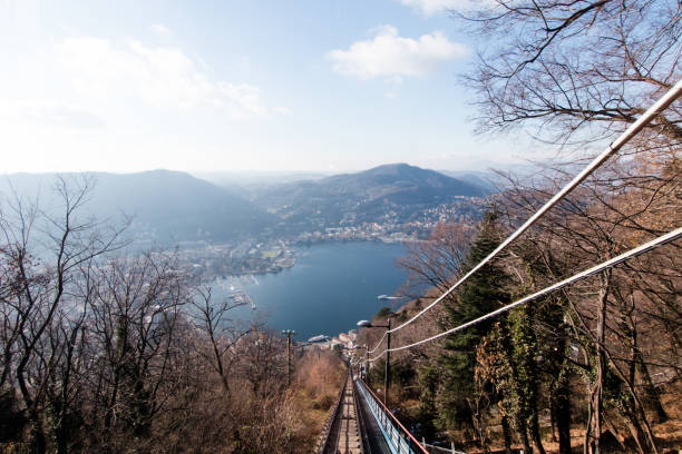 View of Lake Como from the uphill cableway towards Brunate. 1911 cableway connecting Lake Como to the village of Brunate. View in winter