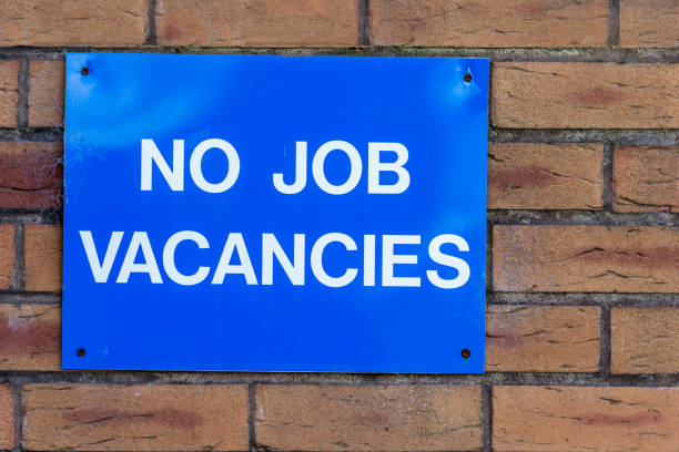 istock No Jobs Blue Advert Sign On Brick Wall 899388748