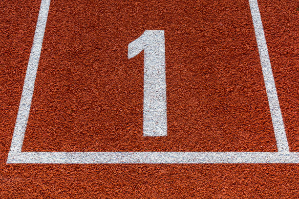 istock Number one on athletics all weather running track. 899392942