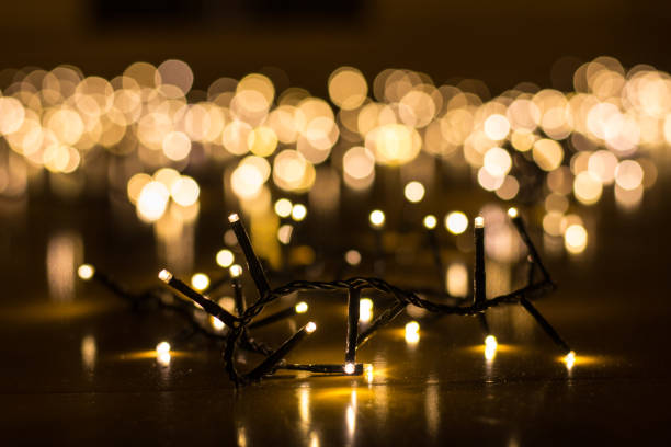 istock Fairy lights for the Christmas tree with blurry background close up 899393032
