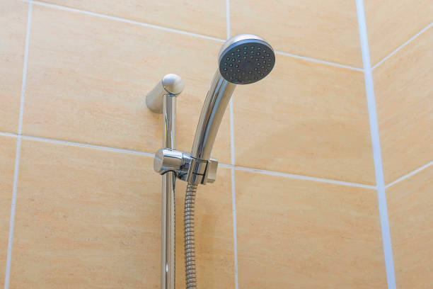 istock bathroom fixtures shower close-up 899406802