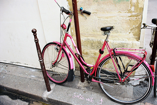 A hand painted pink bike in Paris.