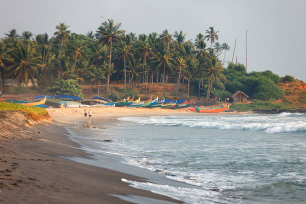 istock Beautiful black beach in Varkala, Kerala, India 899411884