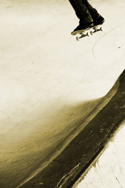 istock Skateboarder Skating off a Ledge into the Air 89941577