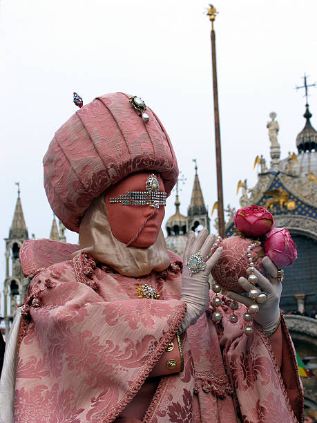 Venice Carnival: mask in pink stock photo