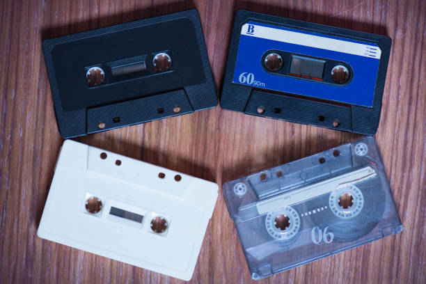 istock Old cassette tapes with a wooden background 899422644