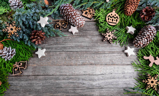 istock Christmas tree and nuts on wooden boards. 899428332