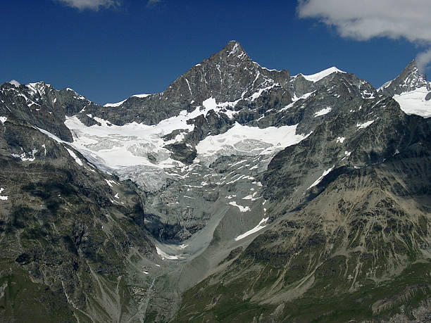 istock Alpine mountain valley with snow and glacier 89943658