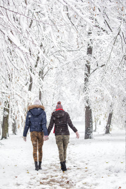 istock Young women enjoying in snow 899437578