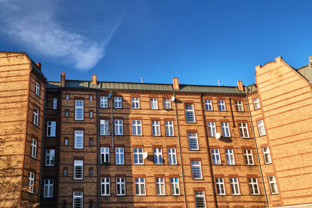 istock The facade of red brick building 899438174