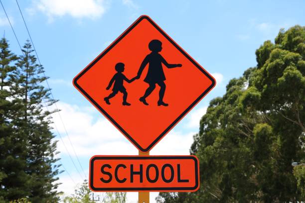 Traffic Sign Kids School, Western Australia Traffic Sign Kids School, Western Australia cottesloe beach stock pictures, royalty-free photos & images