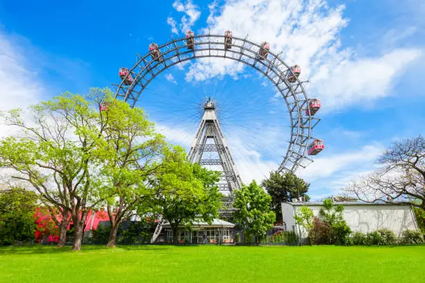 The Wiener Riesenrad or Vienna Giant Wheel 65m tall Ferris wheel in Prater park in Austria, Vienna. Wiener Riesenrad Prater is 