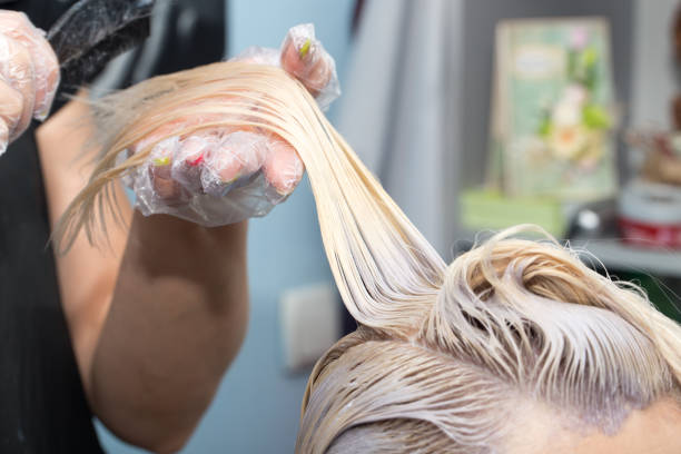 istock hair coloring in the salon 899458290