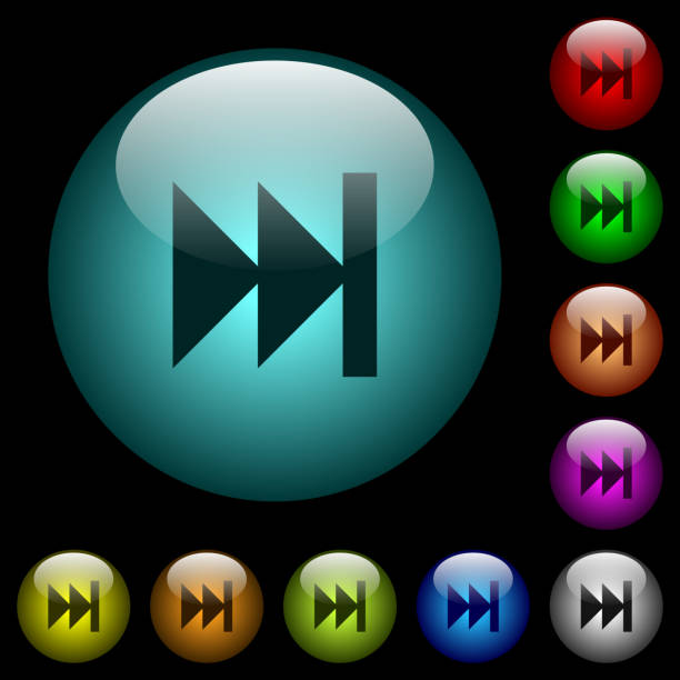 istock Media fast forward icons in color illuminated glass buttons 899458424