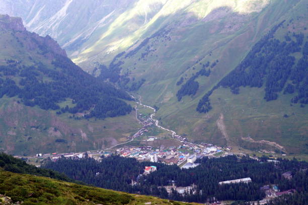 istock City in the Caucasus mountains, top view. 899464744