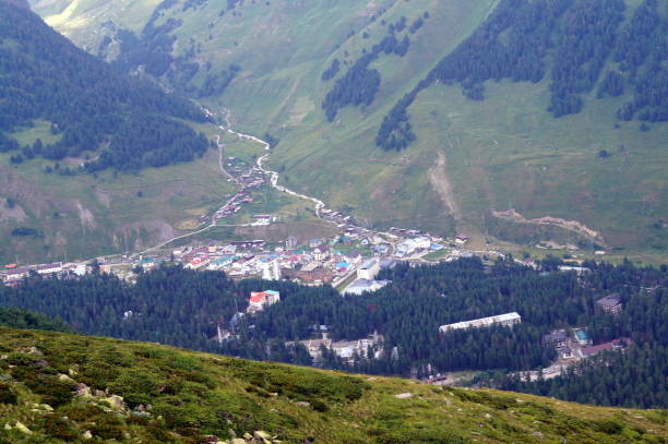 istock City in the Caucasus mountains, top view. 899464820