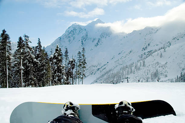 istock Action Sports - Snowboarder Resting 2 89946596