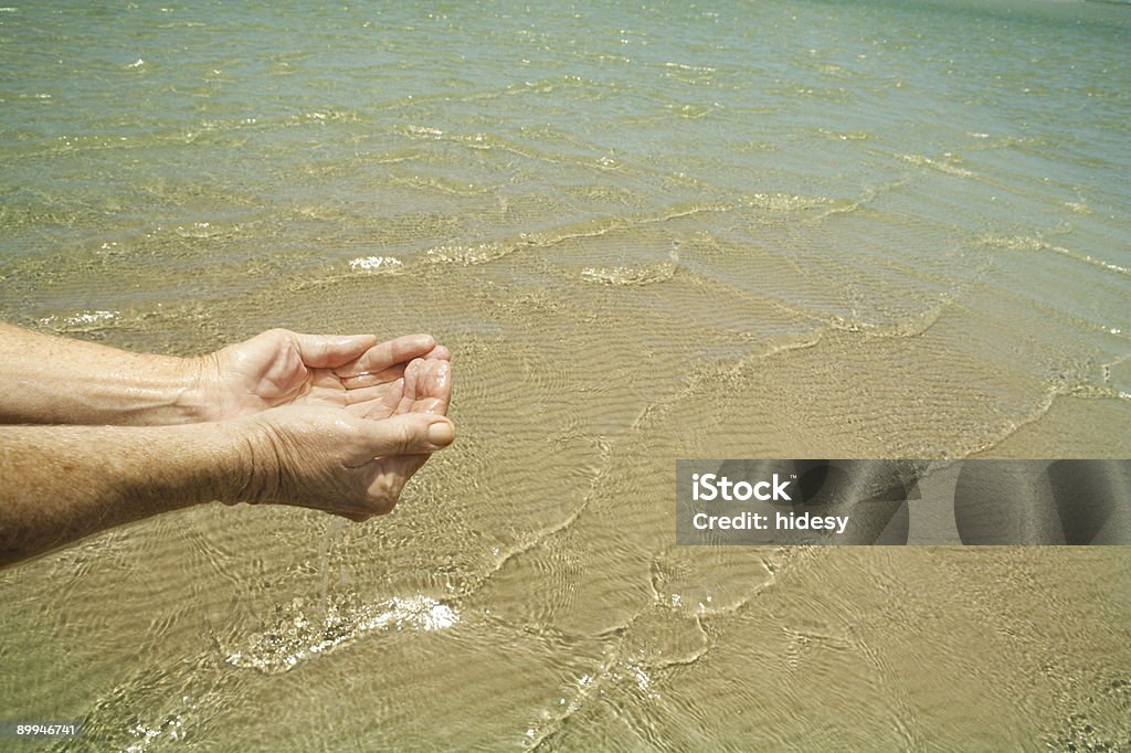 Playa agua - Foto de stock de Manos ahuecadas libre de derechos