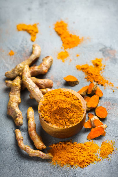 istock Raw turmeric root curcuma longa powder 899468386