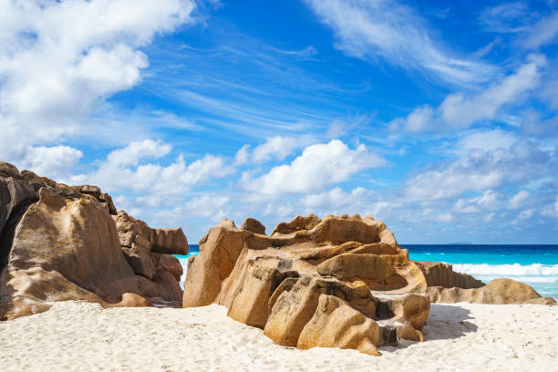 istock granite rocks on seychelles beach, small cove, dike 3 899468500