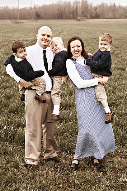 istock Three Energetic Children with Their Parents 89947161
