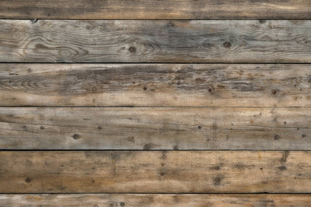 istock Old faded wood plank background 899478870