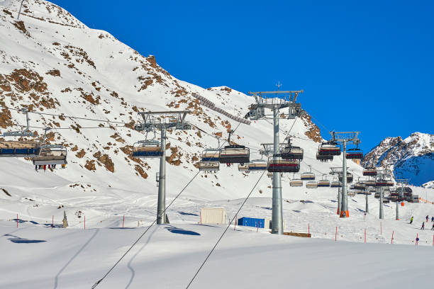 Imst Pitztal, Austria - 02 February 2024: Skier moving along ski touring trail in winter mountains backcountry travel alpine landscape snow tracks outdoor sport equipment ascent descent cold weather slope navigation