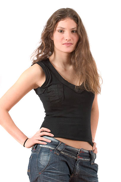 istock Beautiful teenager standing with hands on her hips 89949979