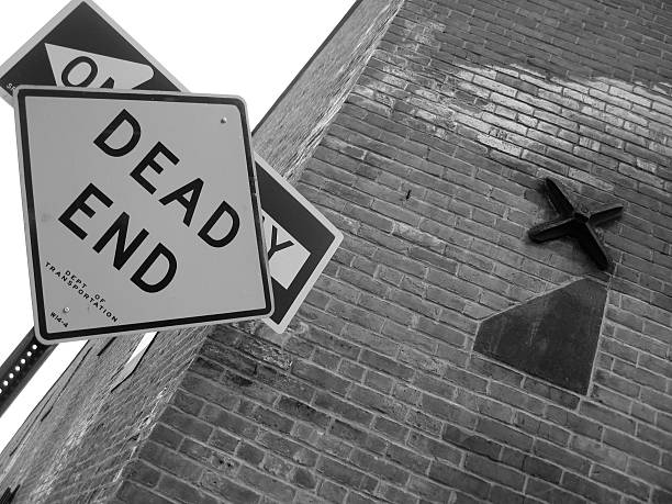 istock dead end sign near brick wall 89949984