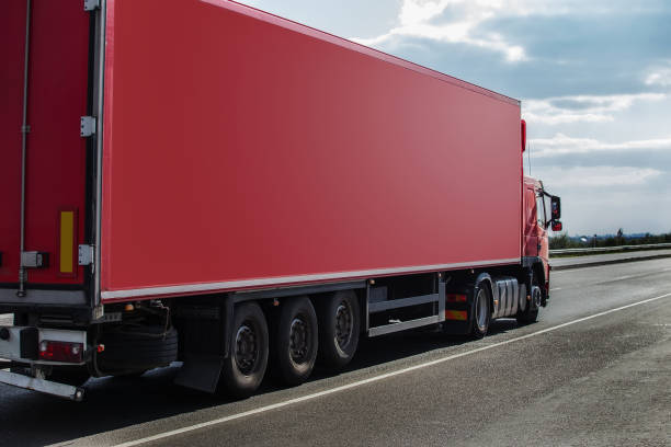 istock truck moves on highway 899502116