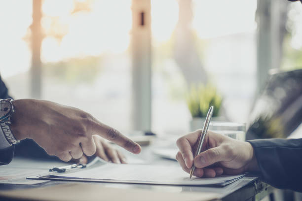 istock Boss manager order his officer to note project business marketing plan 899502480
