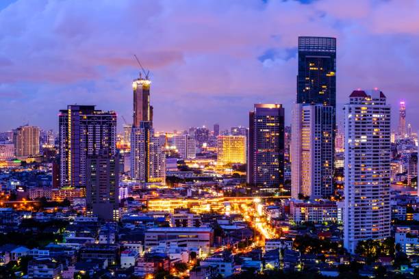 istock Illuminated City Against Cloudy Sky At Dusk 899506504