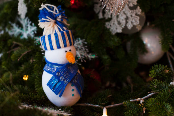istock Christmas greeting card with xmas tree and snowman toy 899525670