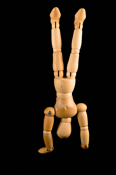 istock Wooden man handstand 89952831