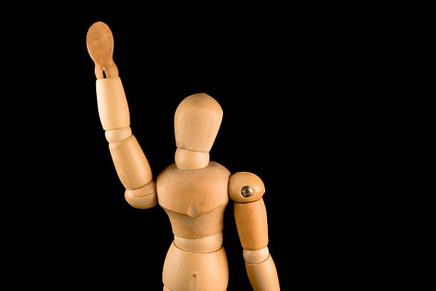 istock Wooden Man Waving 89954148