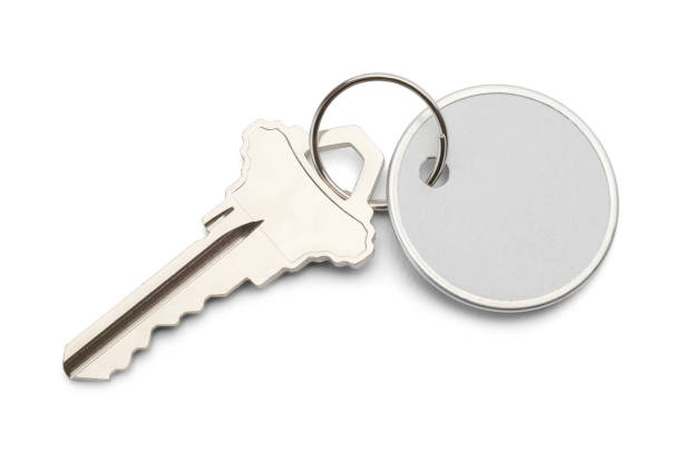 key with round tag - key ring fotos imagens e fotografias de stock