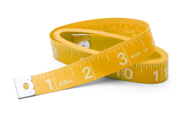 Sewing tape measure wound up in inches Isolated on White Background.