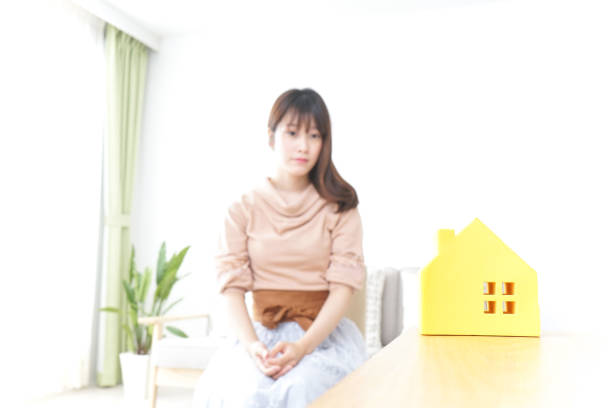 istock Young woman house-hunting image 899563510