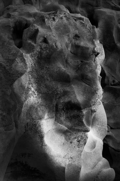 istock Human Face form in the rock 899563886