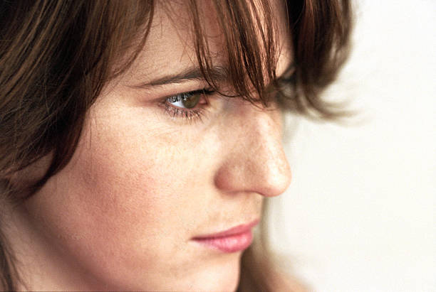 Young woman looking determined stock photo