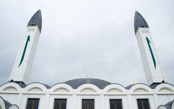 istock Arabic letter Elif on double modern minarets 899566102