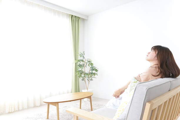 Young woman being relaxed in room
