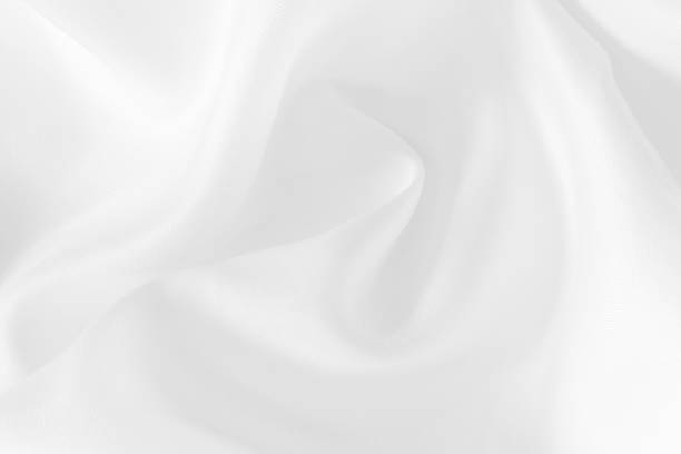 istock White fabric texture for background and design, beautiful pattern of silk or linen. 899566876