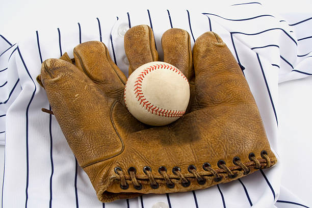 istock Early Era Baseball Glove, Uniform, and Ball 89957500
