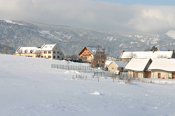 istock Alpine village after a snow storm 89957885