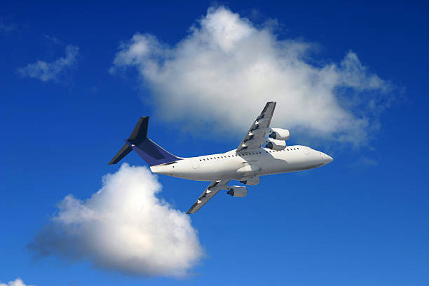 istock Airplane in front of blue sky 89958093