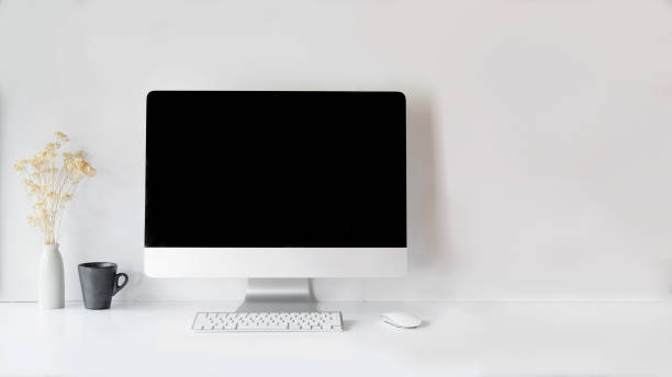 Modern clean workspace mockup with blank screen desktop computer. Modern clean workspace mockup with blank screen desktop computer. computer mouse on table stock pictures, royalty-free photos & images