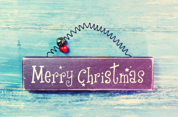 istock merry christmas written on wooden 899584426