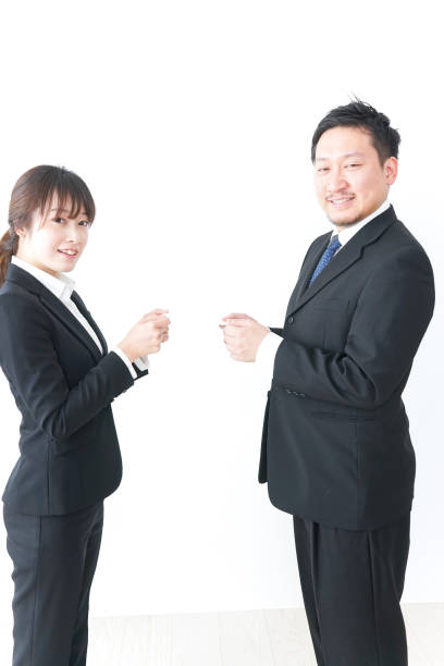 istock Business persons exchanging  business cards 899585804